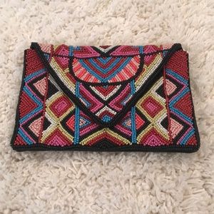 BCBGeneration beaded multicolor clutch